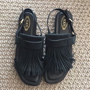 Tod’s black fringe sandals